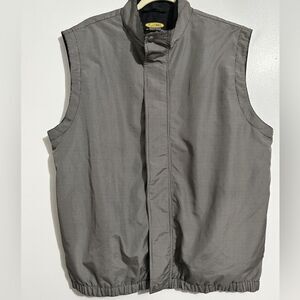 Greg Norman outdoor vest. Zipper and button. Size M